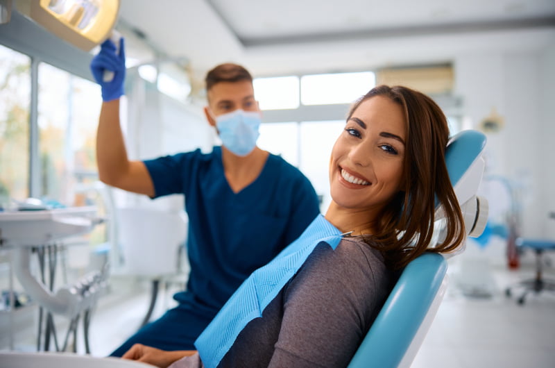 Woman receiving a comfortable dental check-up at Skymark Smile Centre in Mississauga