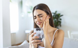 Why Are My Teeth Sensitive? Common Causes & Solutions