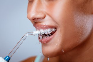 Water Flosser vs Floss: Which Is Better for Your Teeth?