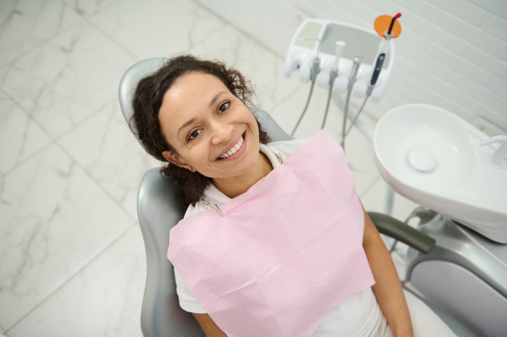 Comparison chart of dental bonding, veneers, and crowns