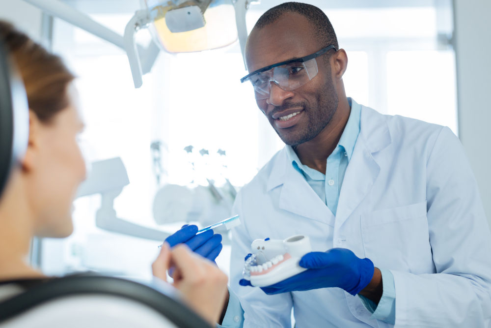 Dental Implant Options When CDCP Does Not Cover Treatment Mississauga dentist explaining dental implant options and CDCP coverage limitations to patient
