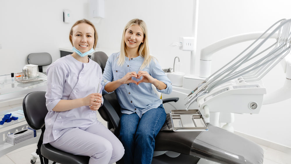 Patient trust in a family dentist A dentist and patient showing a positive relationship and trust during a dental appointment at a family dental clinic in Mississauga.