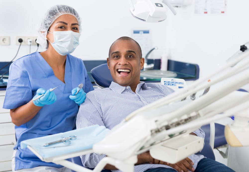 Expert Dental Consultation for Personalized Care Dentist consulting with a patient about oral health